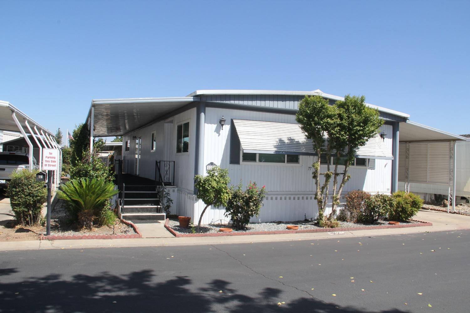 front view of a house with a street