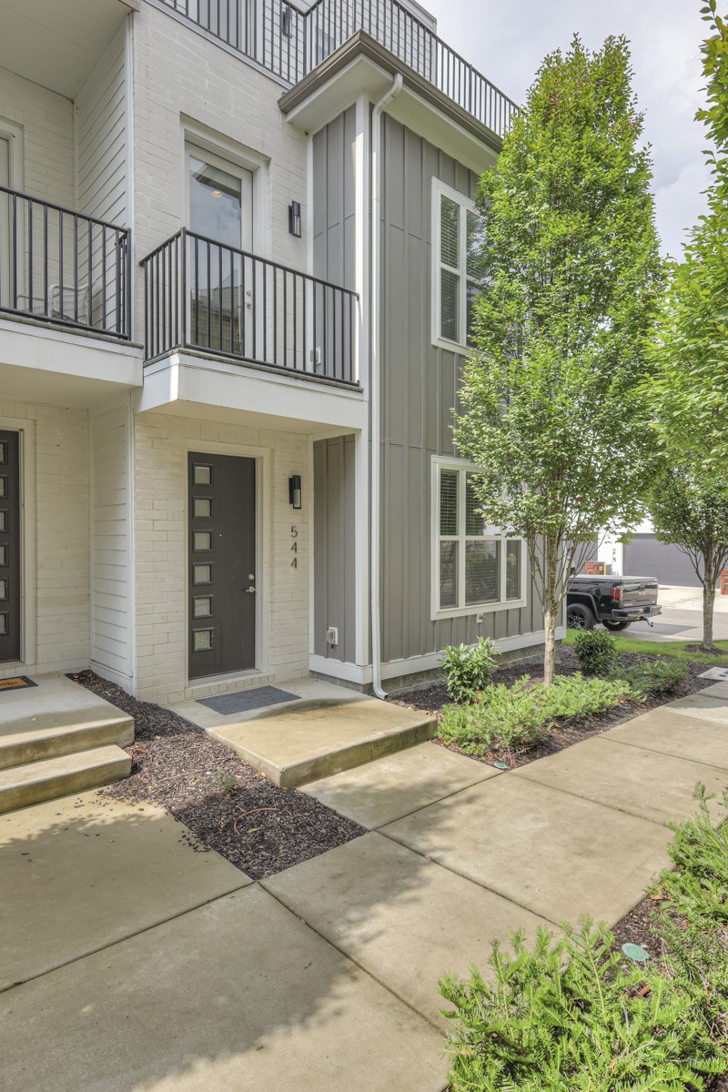 Welcome home! This end unit has so much to offer. The stylish front door is great for welcoming guests or going out to enjoy the community amenities, but you'll love parking in your own private 2-car garage in the back.