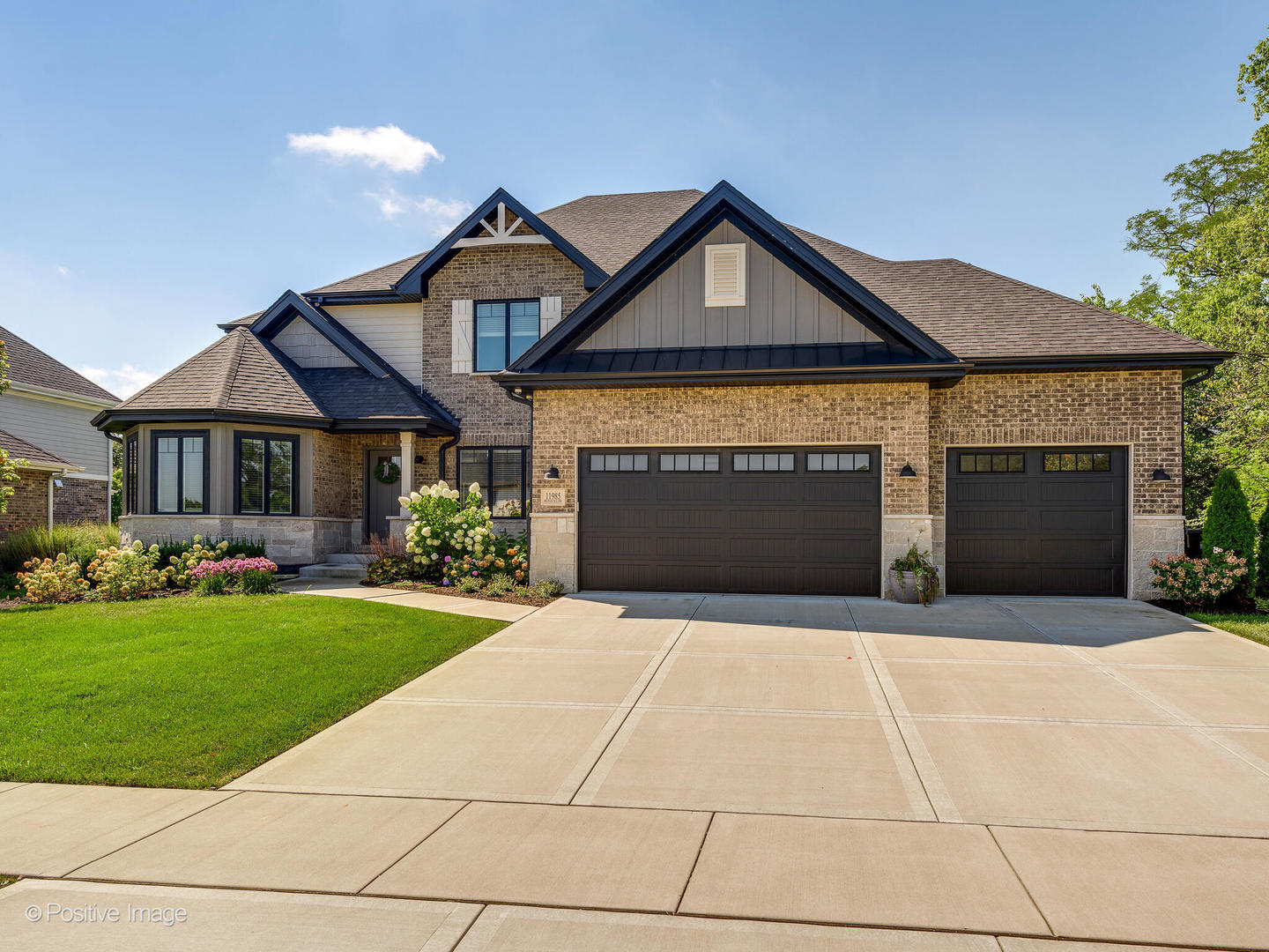 a front view of a house with yard