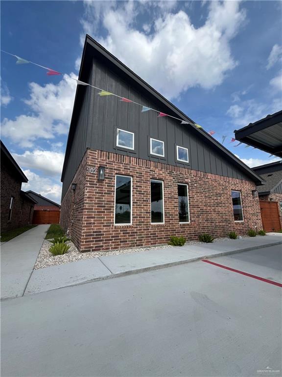 a front view of a house with a garage