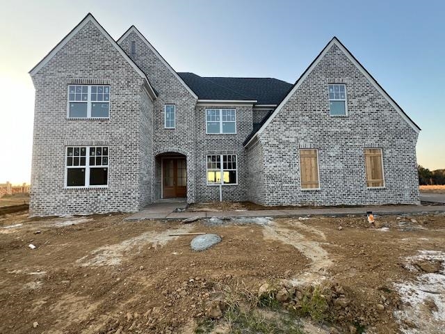 View of front of property with a patio