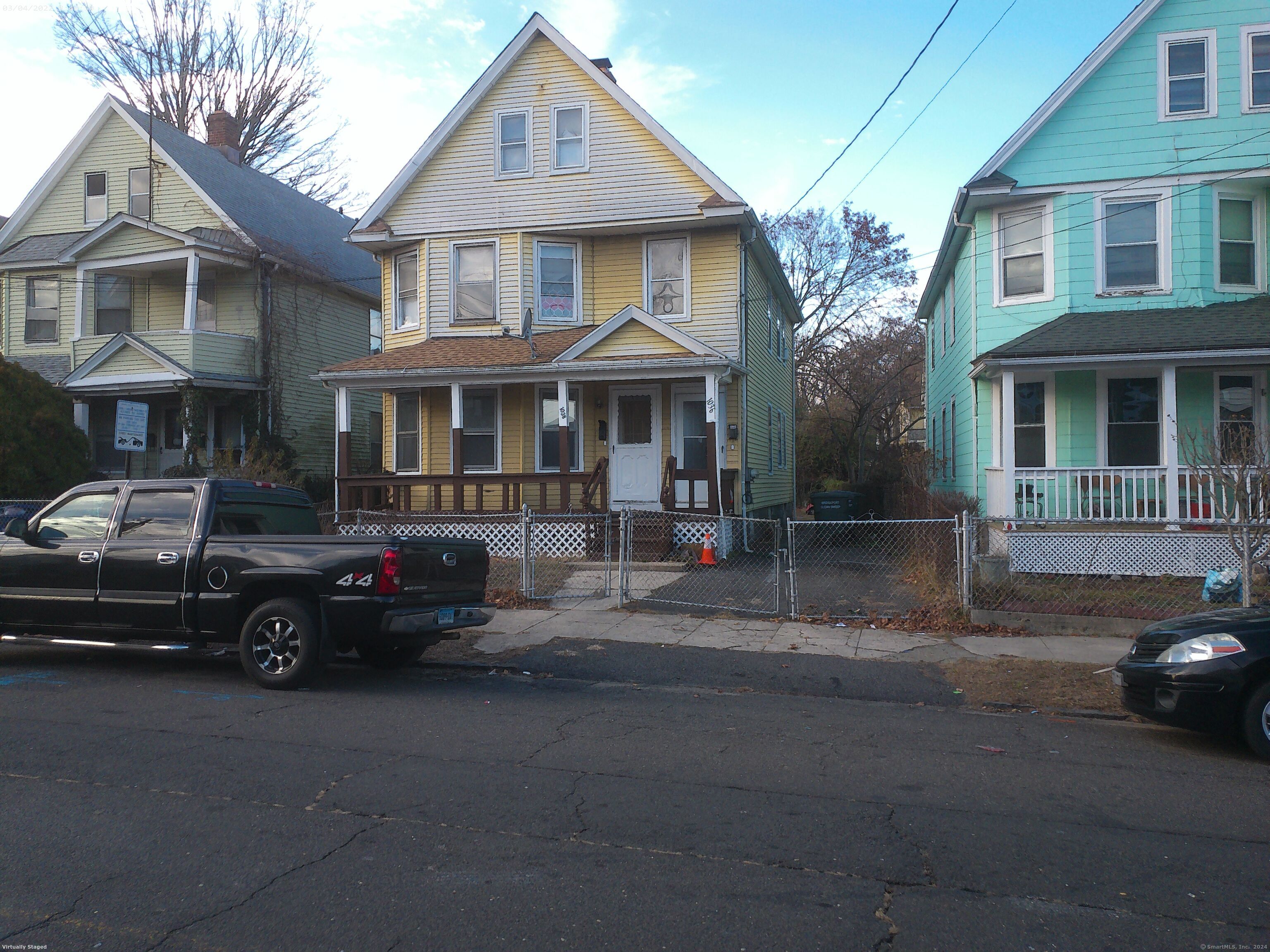 a car parked in front of a house