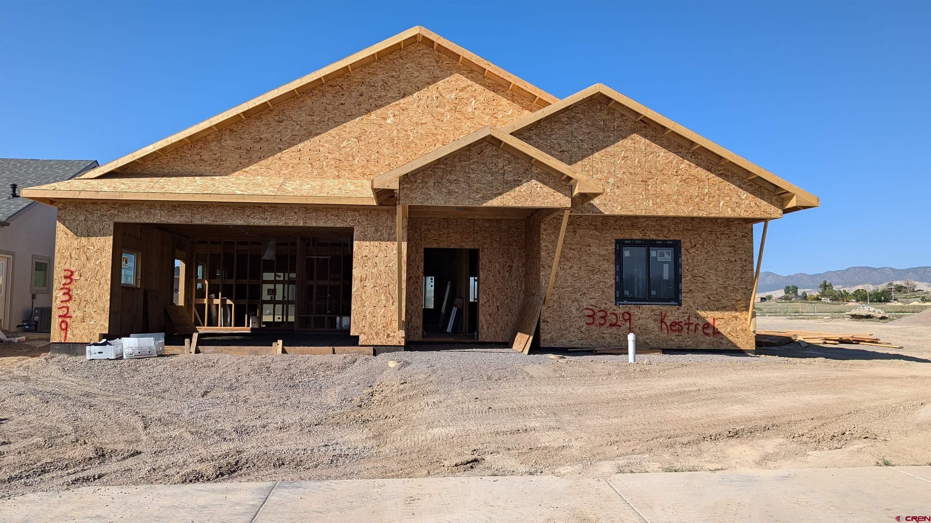 a view of a house with outdoor seating