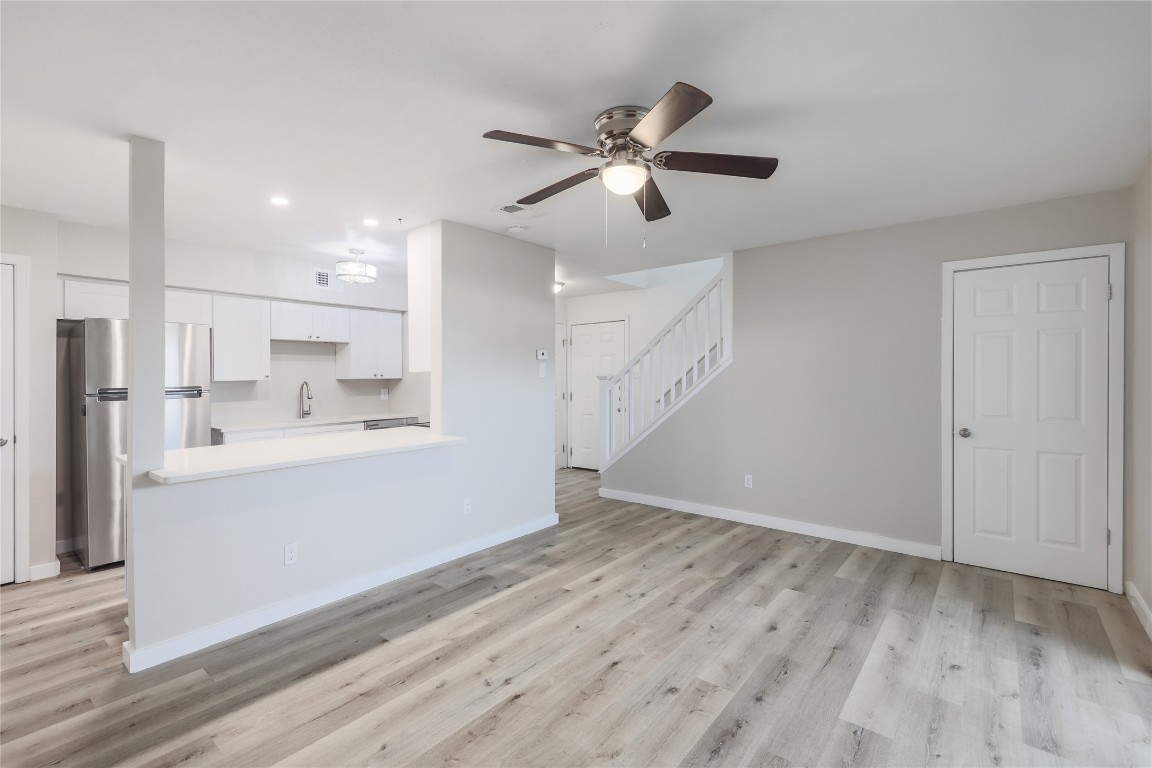 a view of kitchen with wooden floor