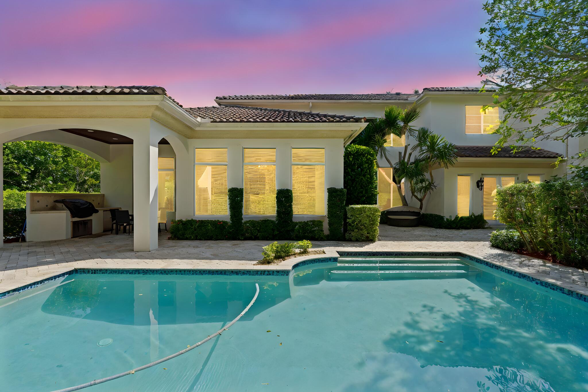 a view of a house with a swimming pool