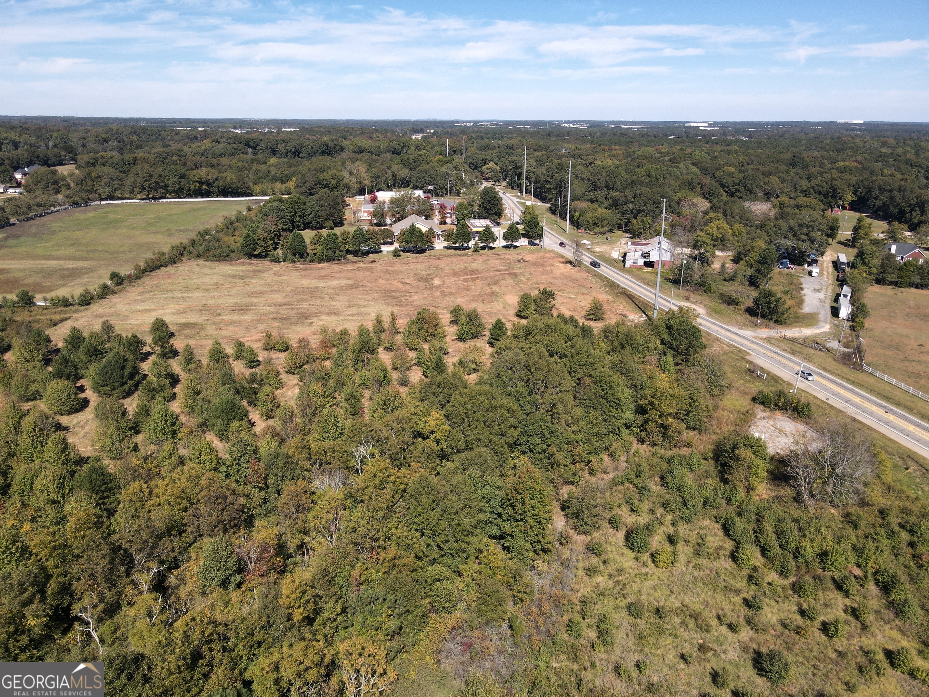 an aerial view of a houses with outdoor space