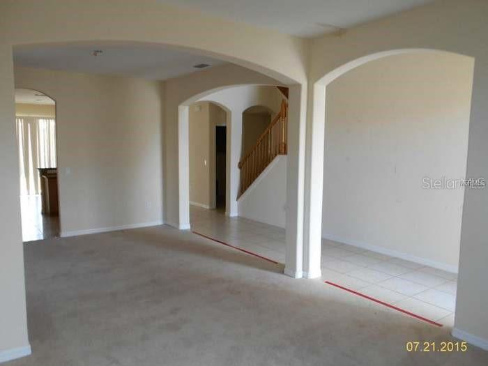 a view of a hallway with entryway