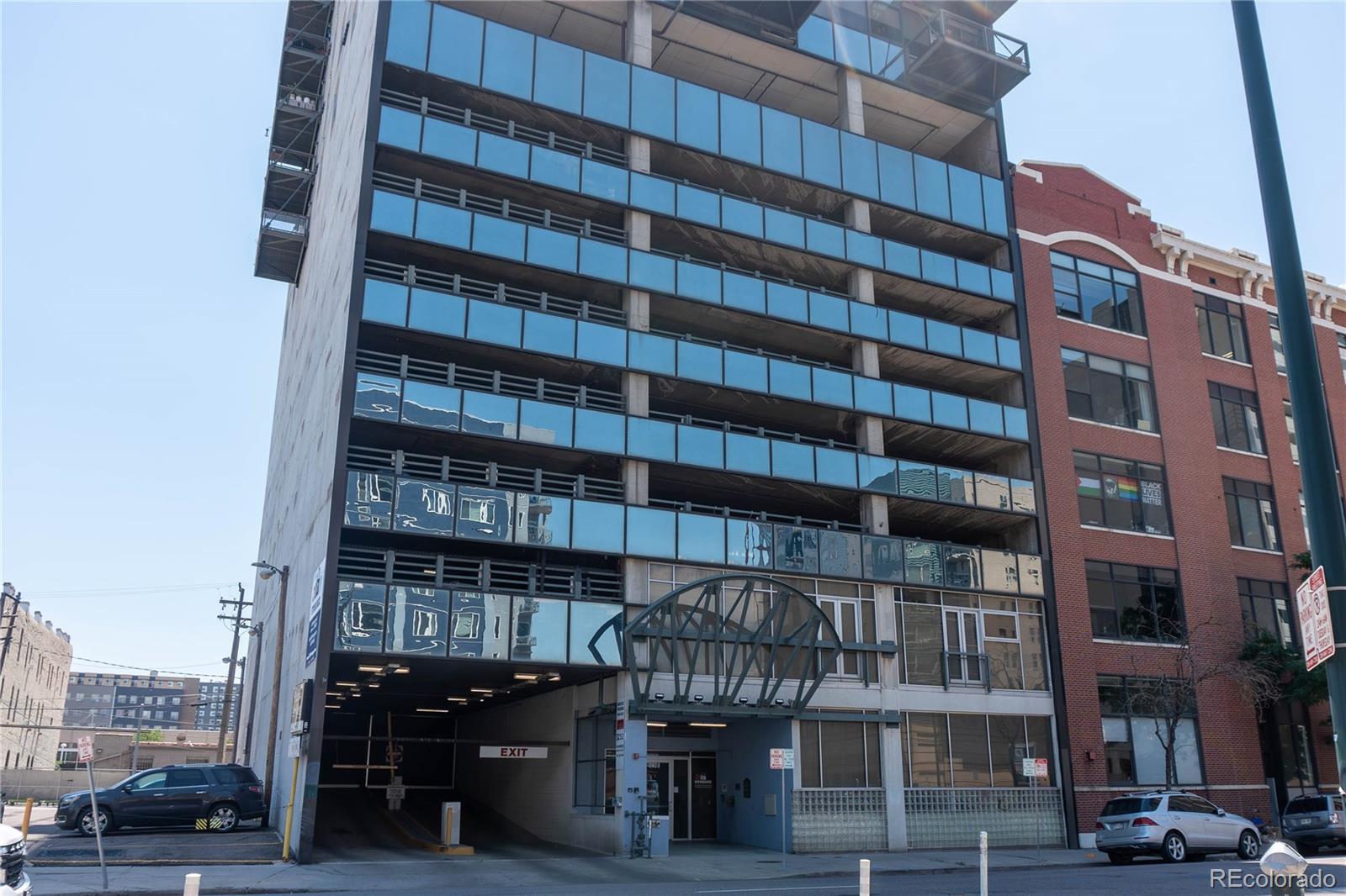 a front view of a building with glass windows