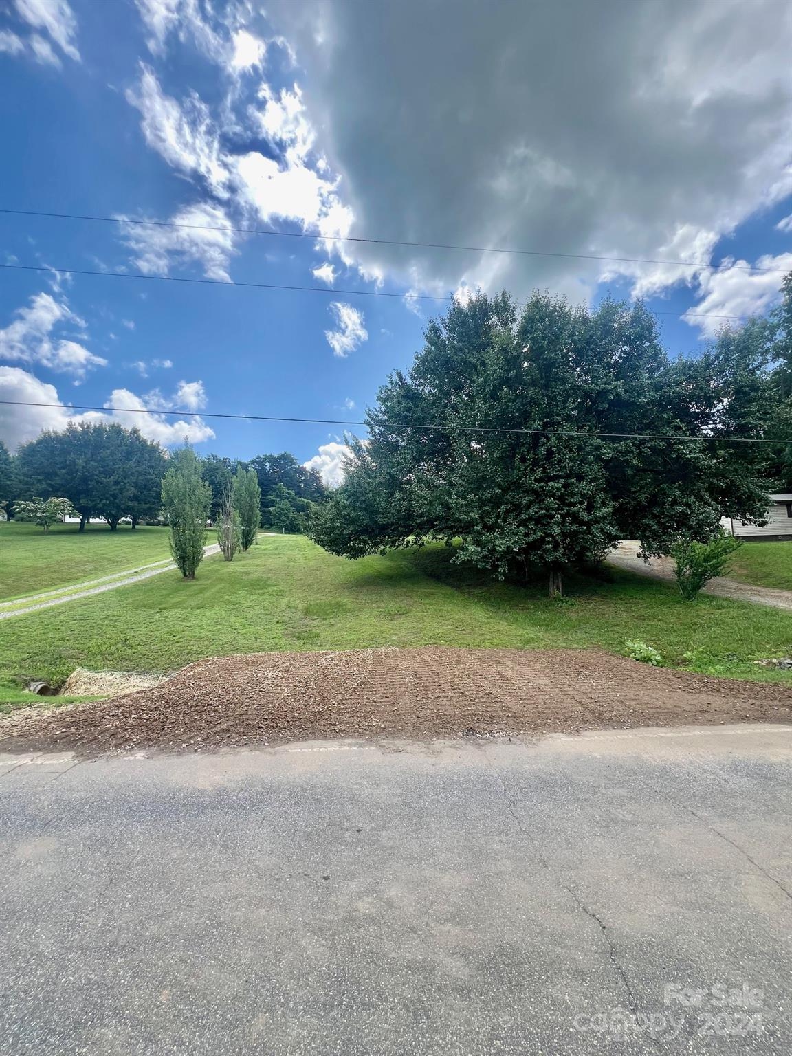 a view of a golf course with a house