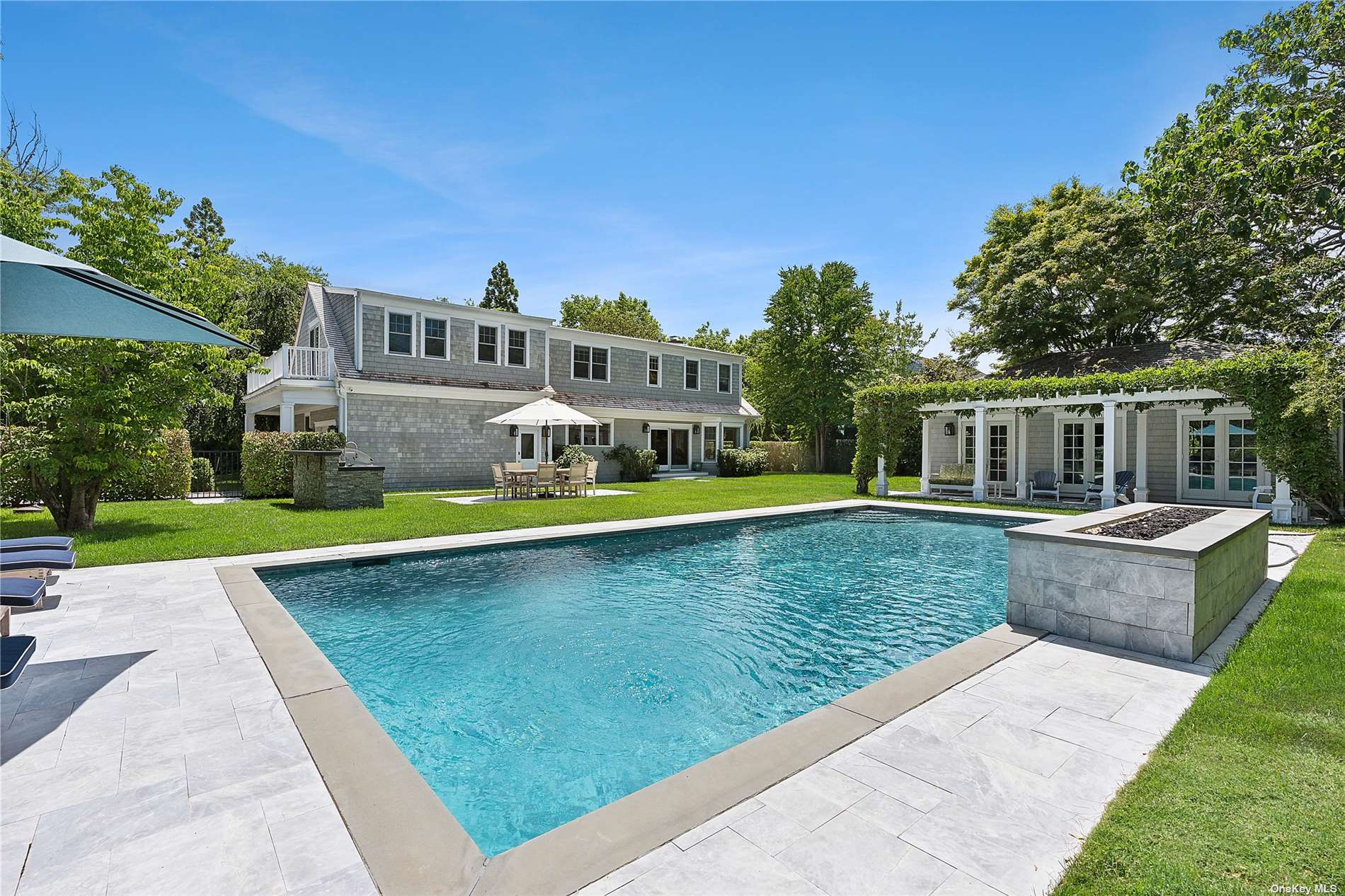 a view of a house with swimming pool