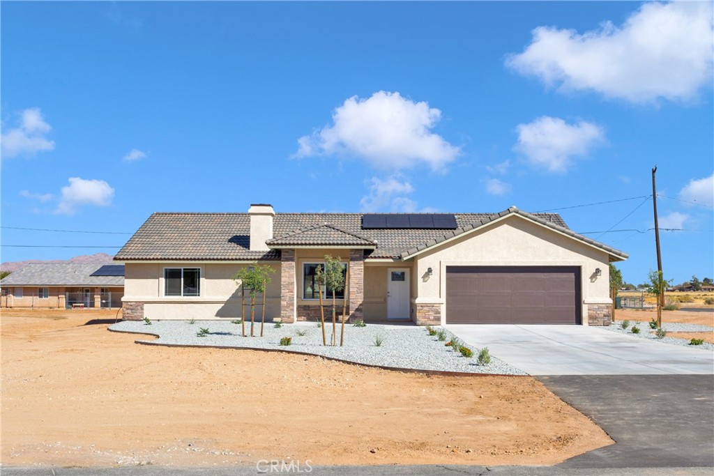 front view of a house with a patio