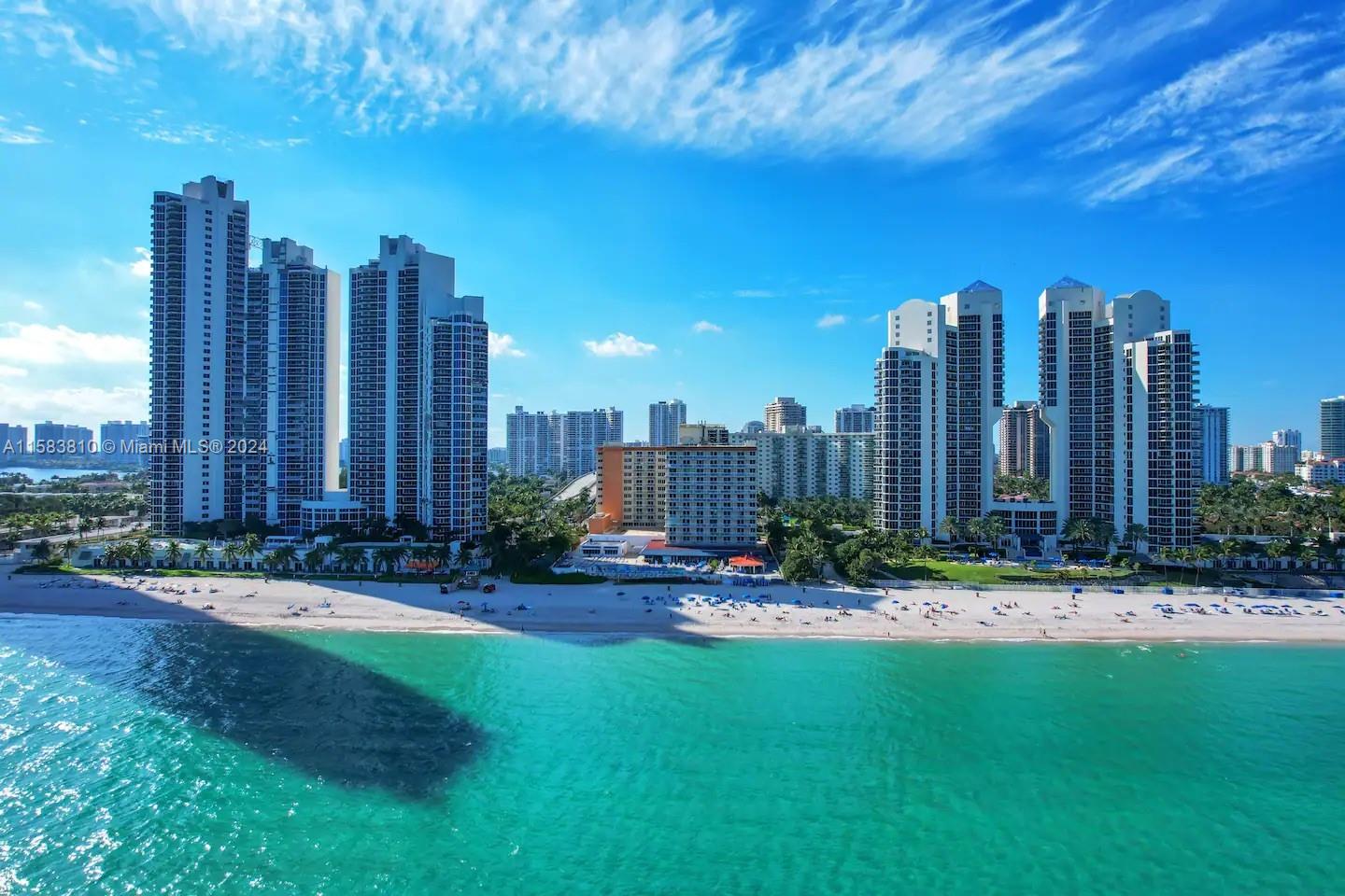 a view of a city with tall buildings