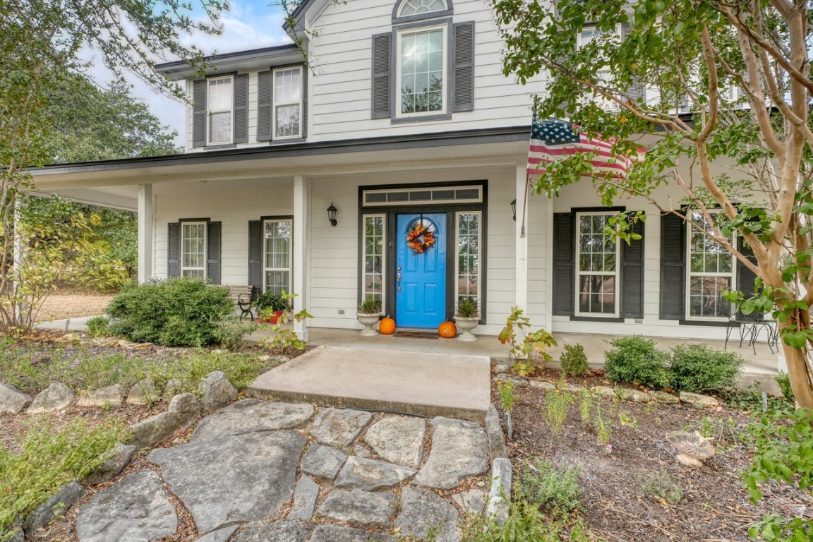 front view of a house with a small yard