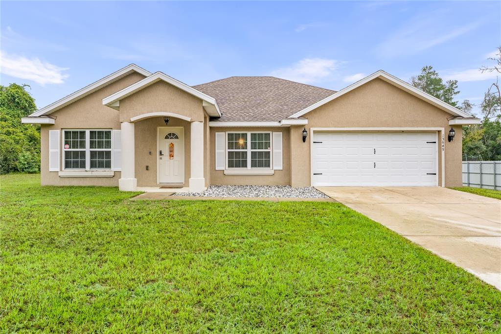 front view of house with a yard