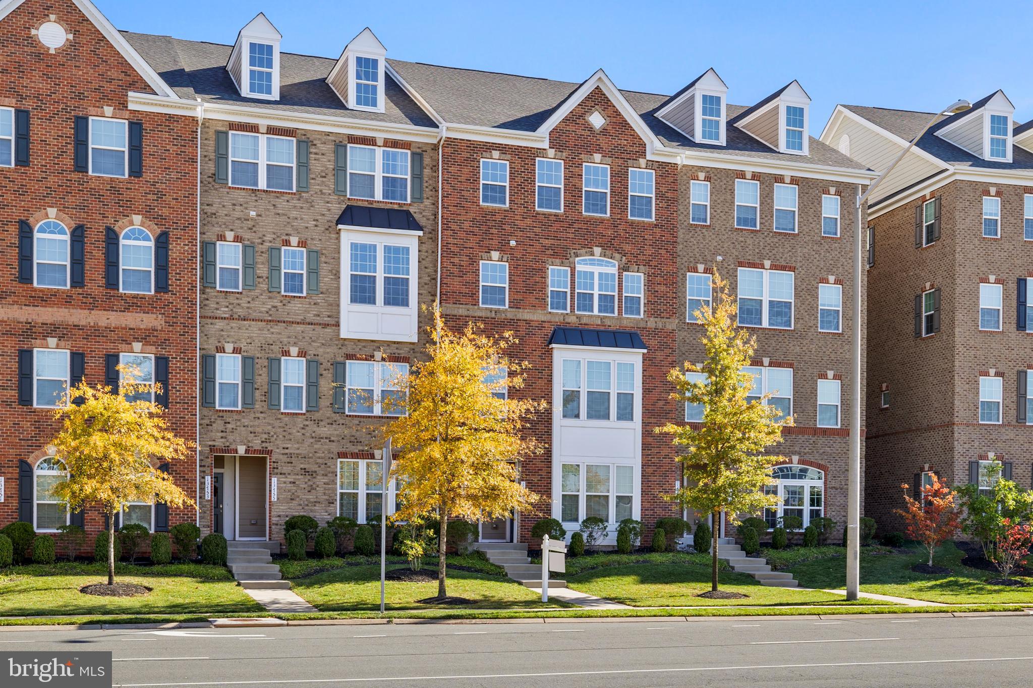 a front view of a multi story residential apartment building