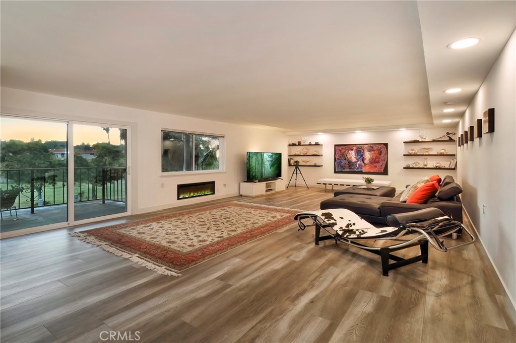 a living room with patio area