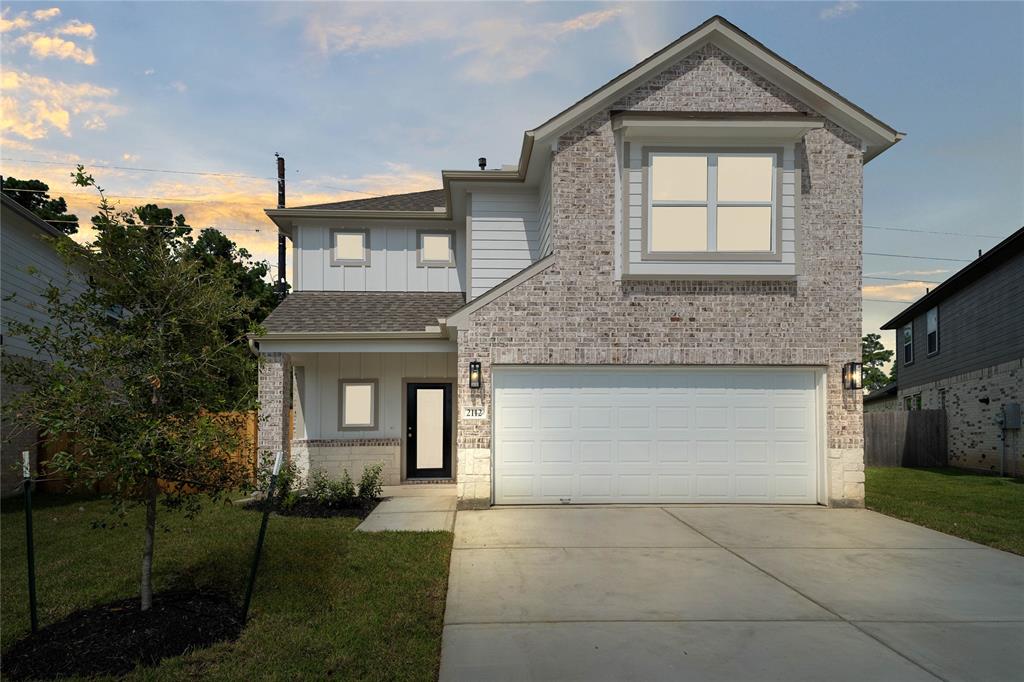 Welcome home to 2112 Reed Cave Lane located in Forest Village and zoned to Conroe ISD.