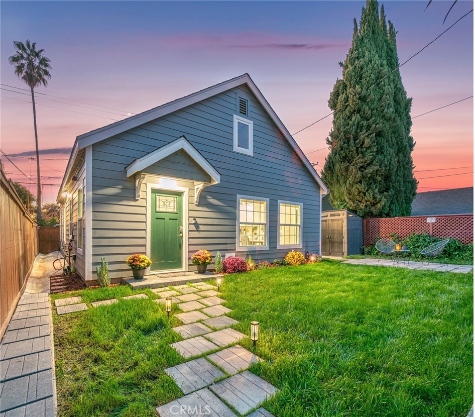 a front view of house with yard