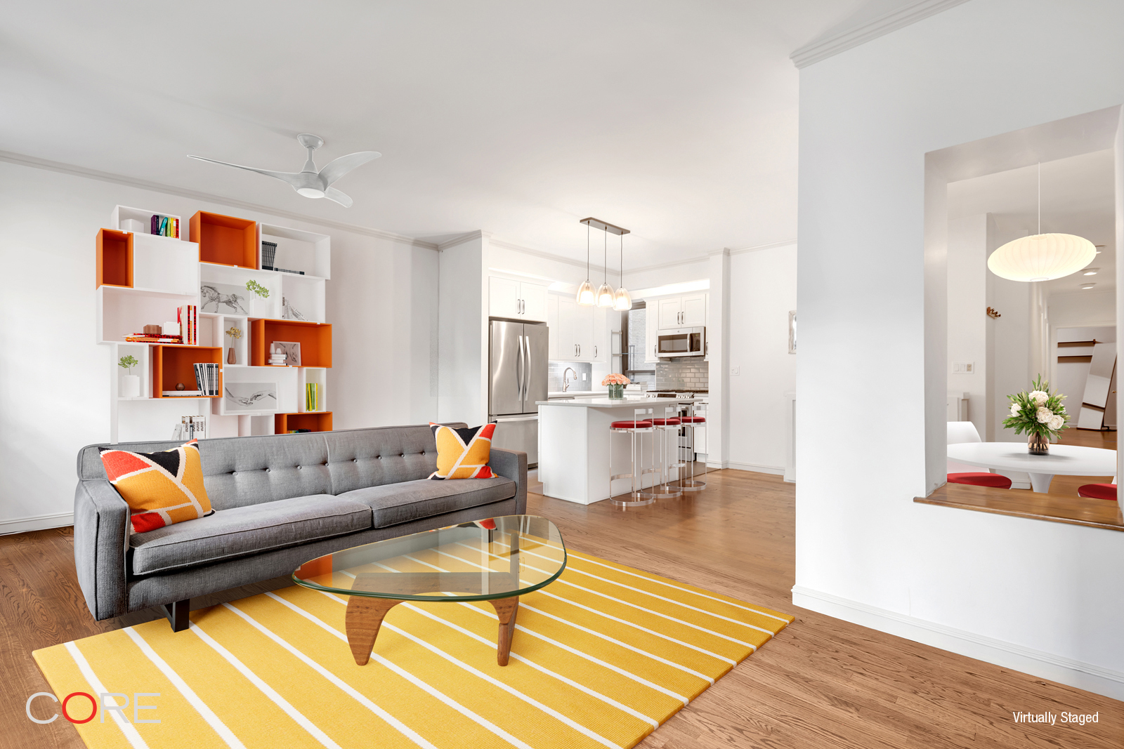 a living room with furniture and a rug