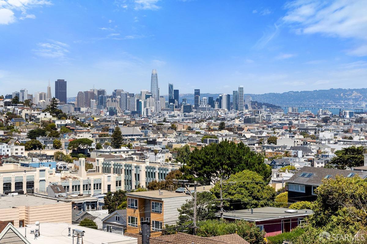 a view of a city with tall buildings