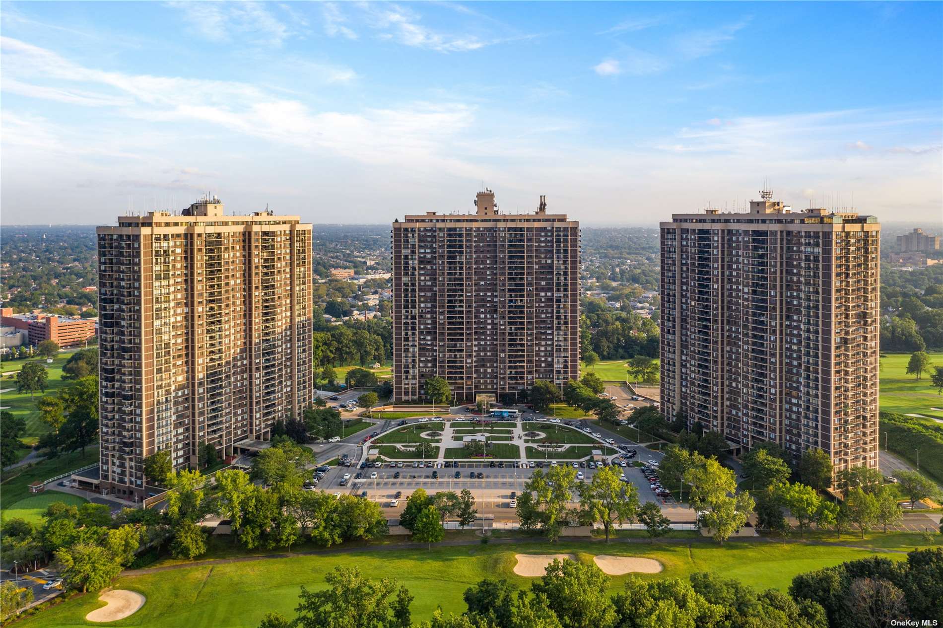 a view of a city with tall buildings