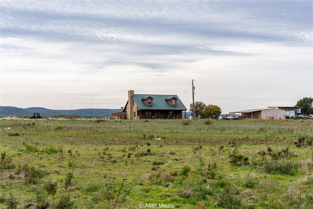 View of yard featuring a mountain view and a rural view