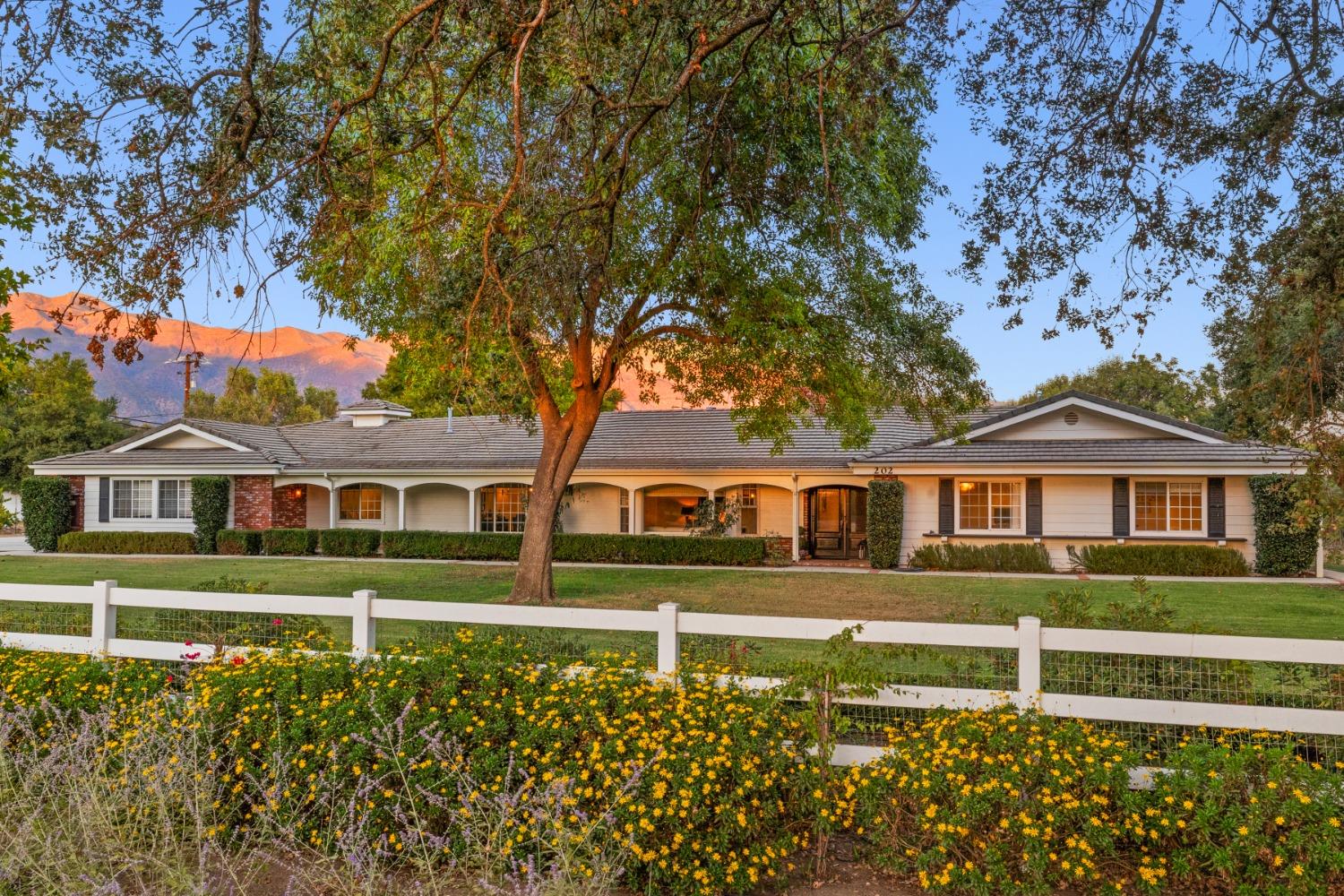 front view of a house with a big yard