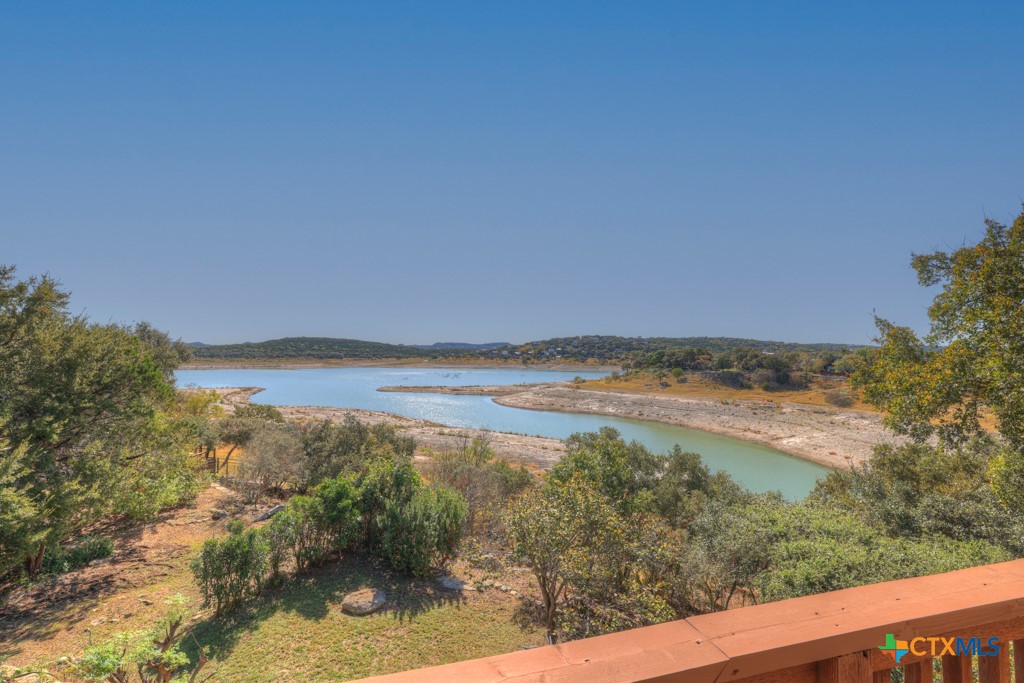 a view of a lake from a yard