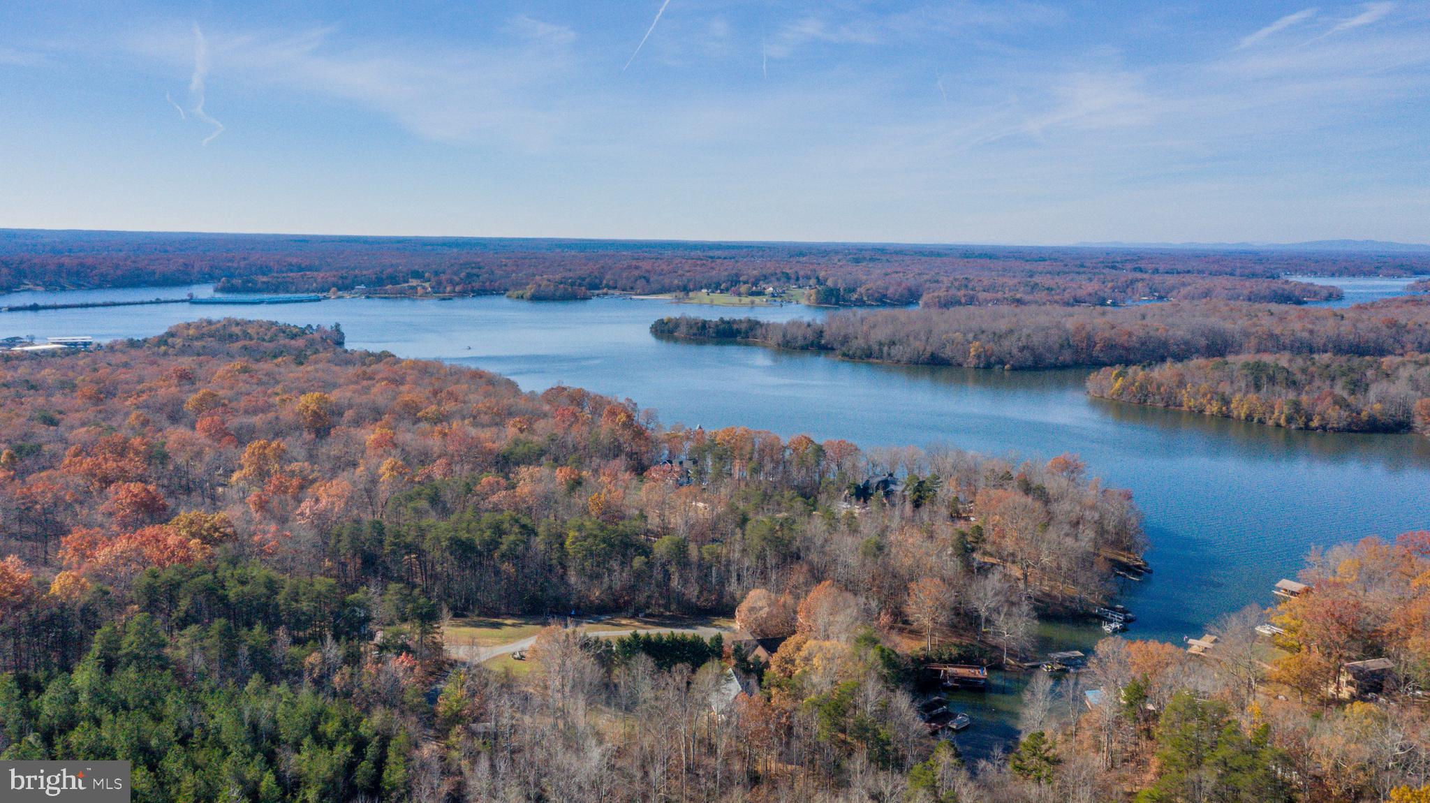 an aerial view of valley and lake