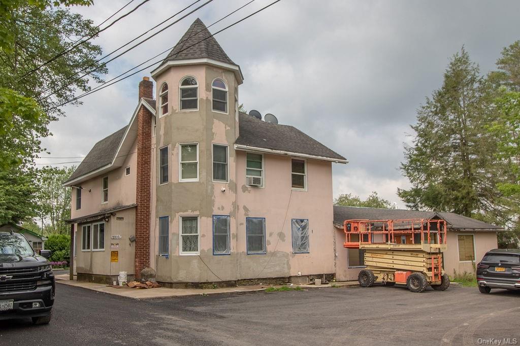 a car parked in front of a house