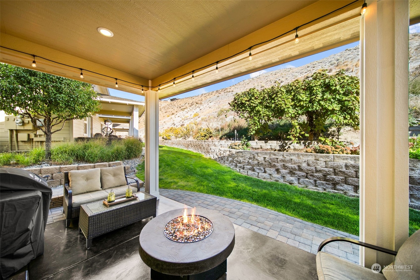 a outdoor living space with furniture and garden