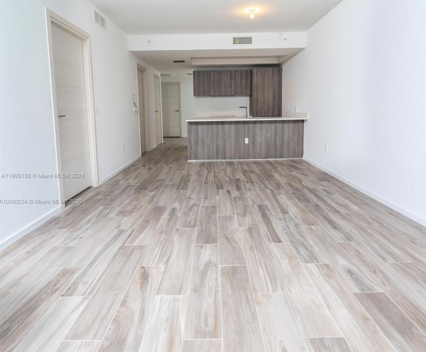 wooden floor and window in a room