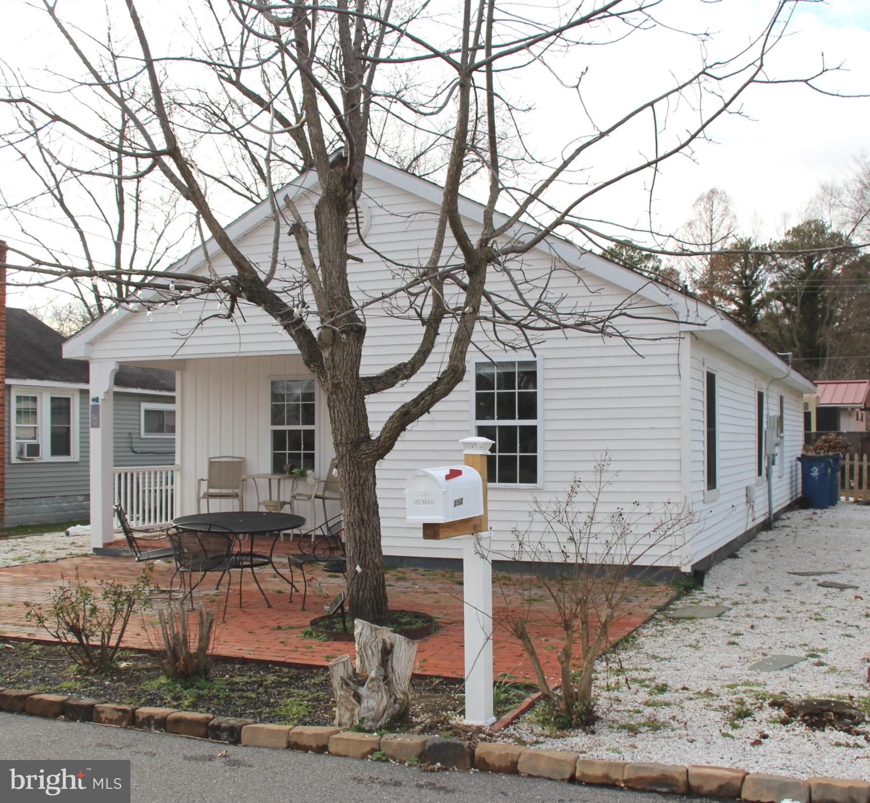 a front view of a house with garage