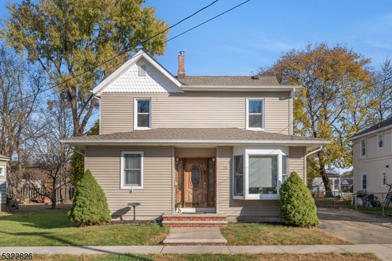 front view of a house and a yard