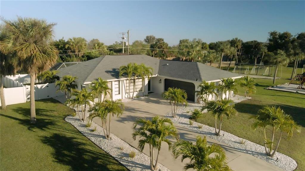 a view of a swimming pool with a patio