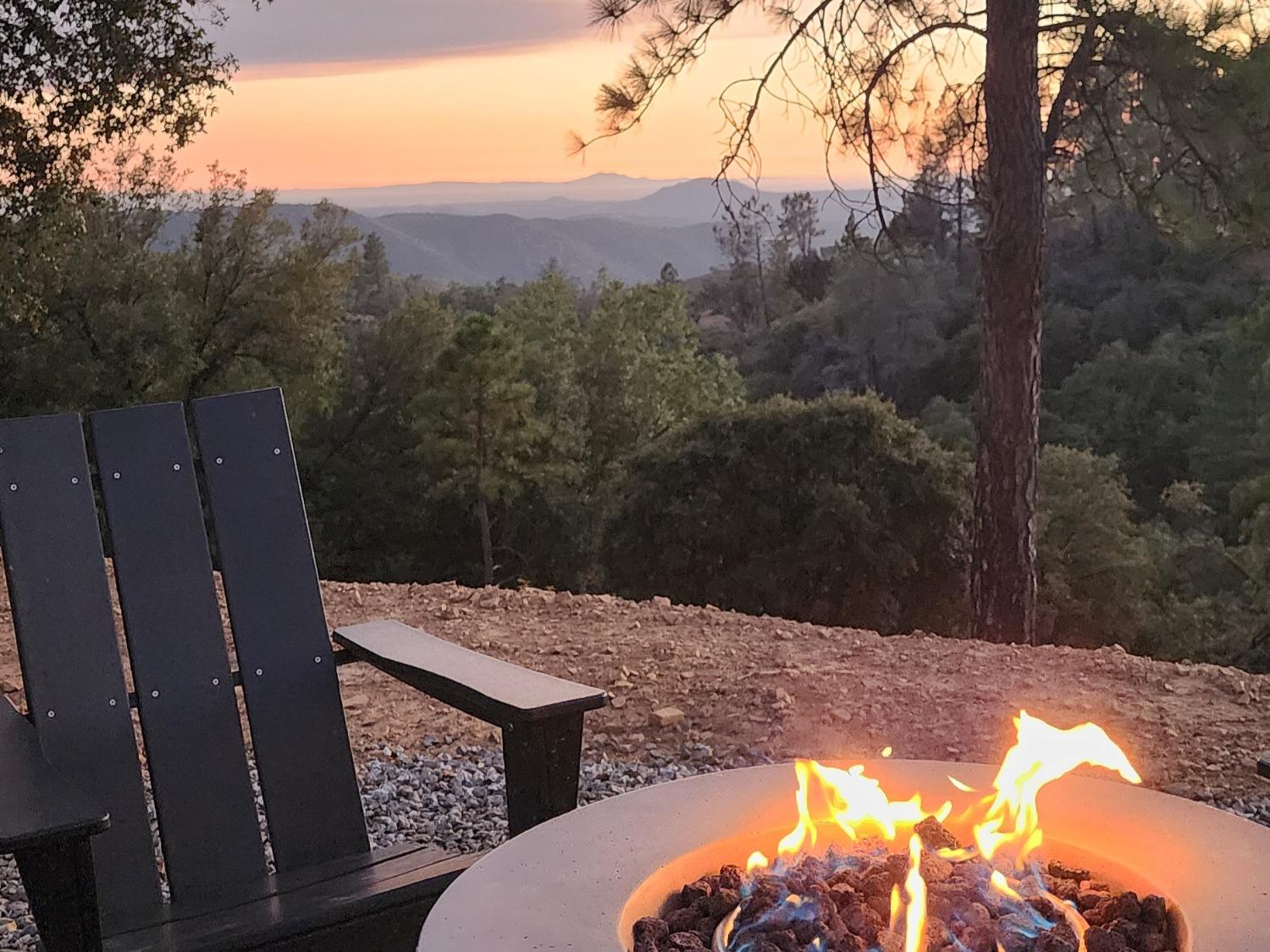 a view of a backyard with mountain view