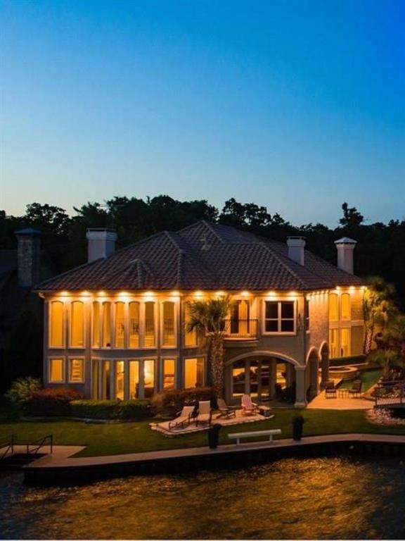 a view of swimming pool with outdoor seating and yard