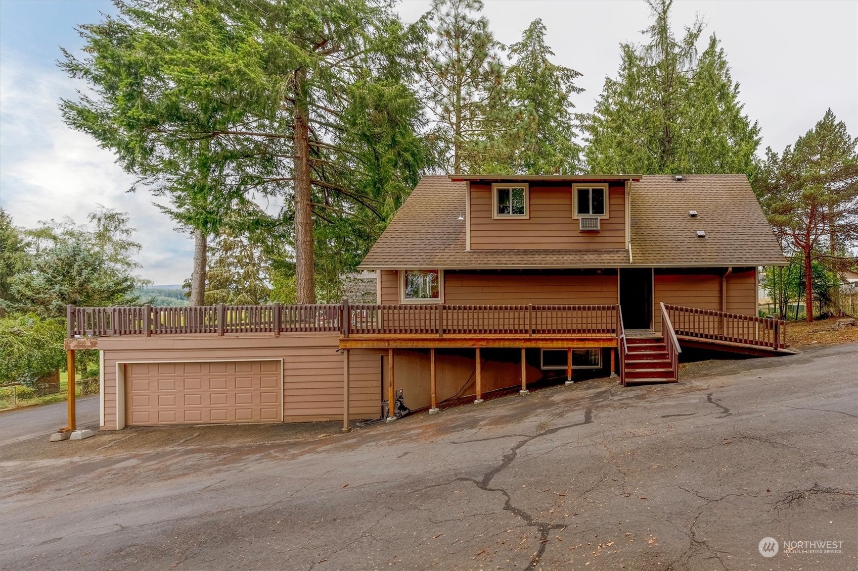 a view of house with trees in the background