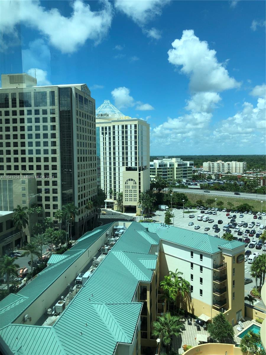 a view of a city with tall buildings