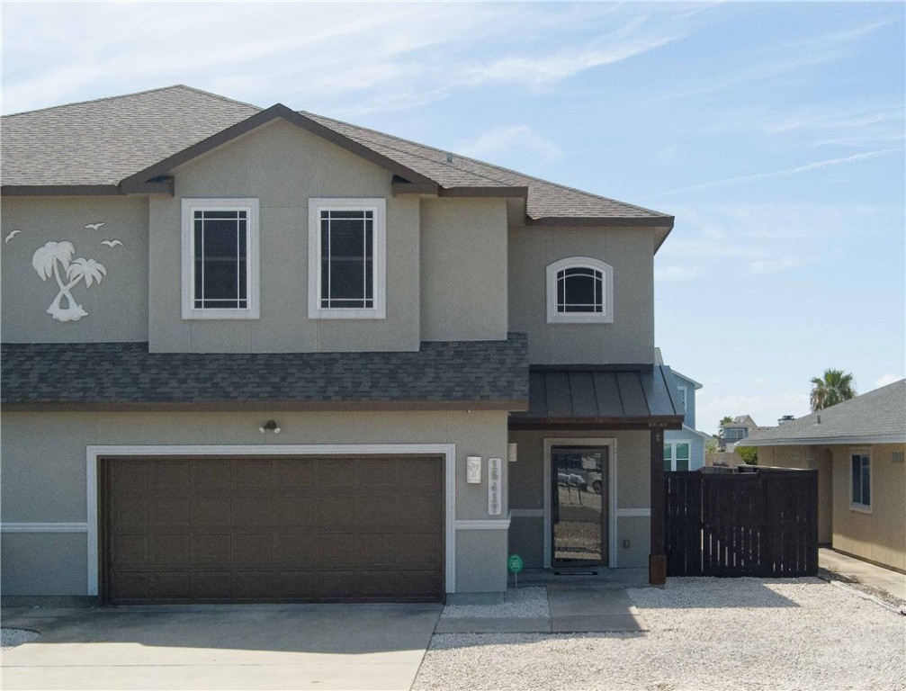 a front view of a house with yard