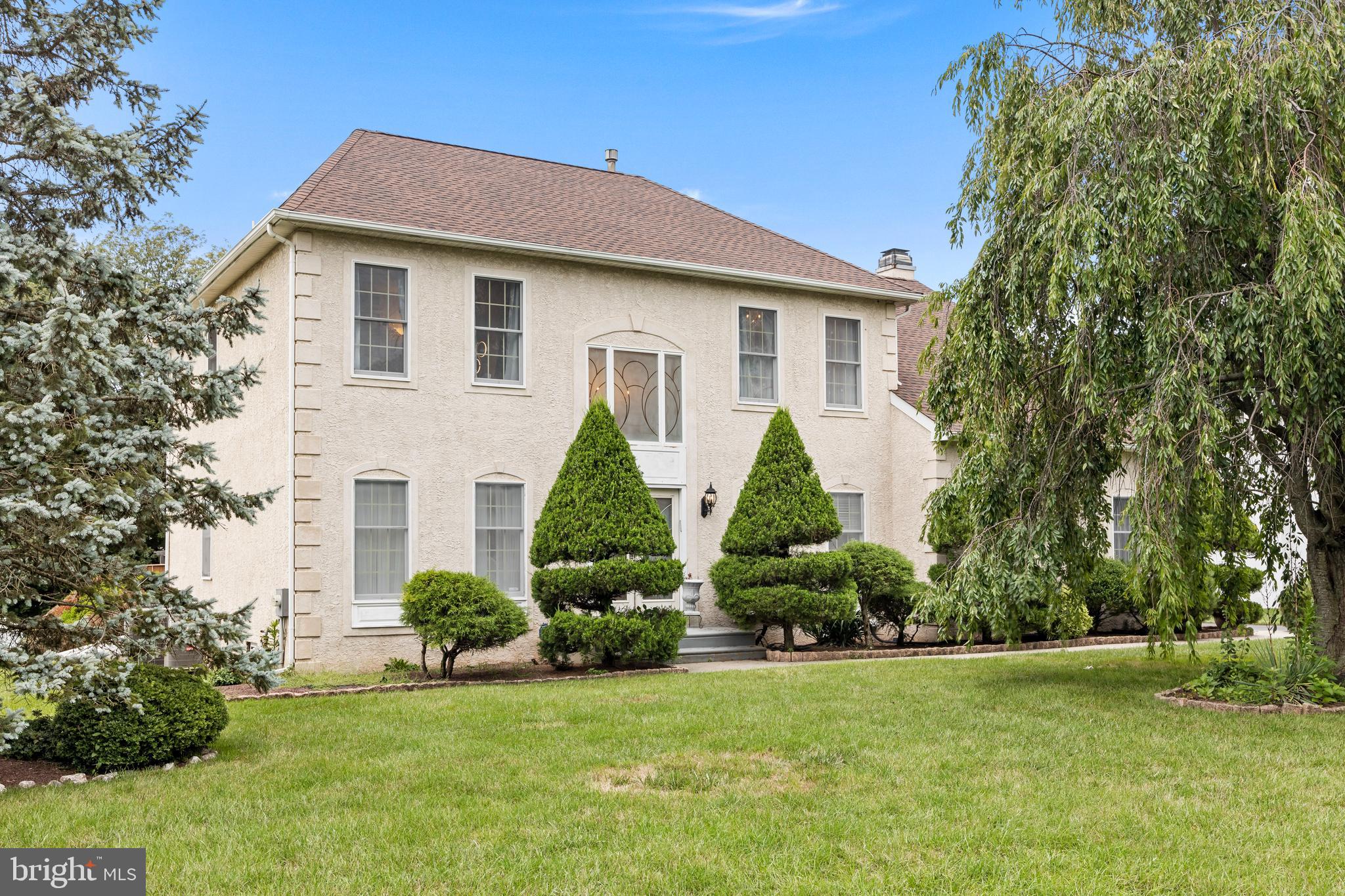 a view of a house with garden