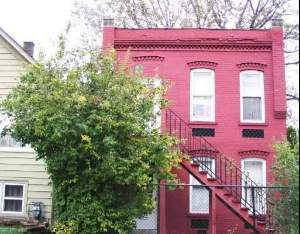 a front view of a building with yard