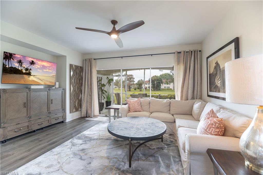 Living Room and lanai with golf course view