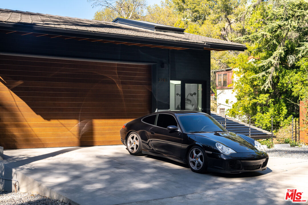 a car parked in front of a house