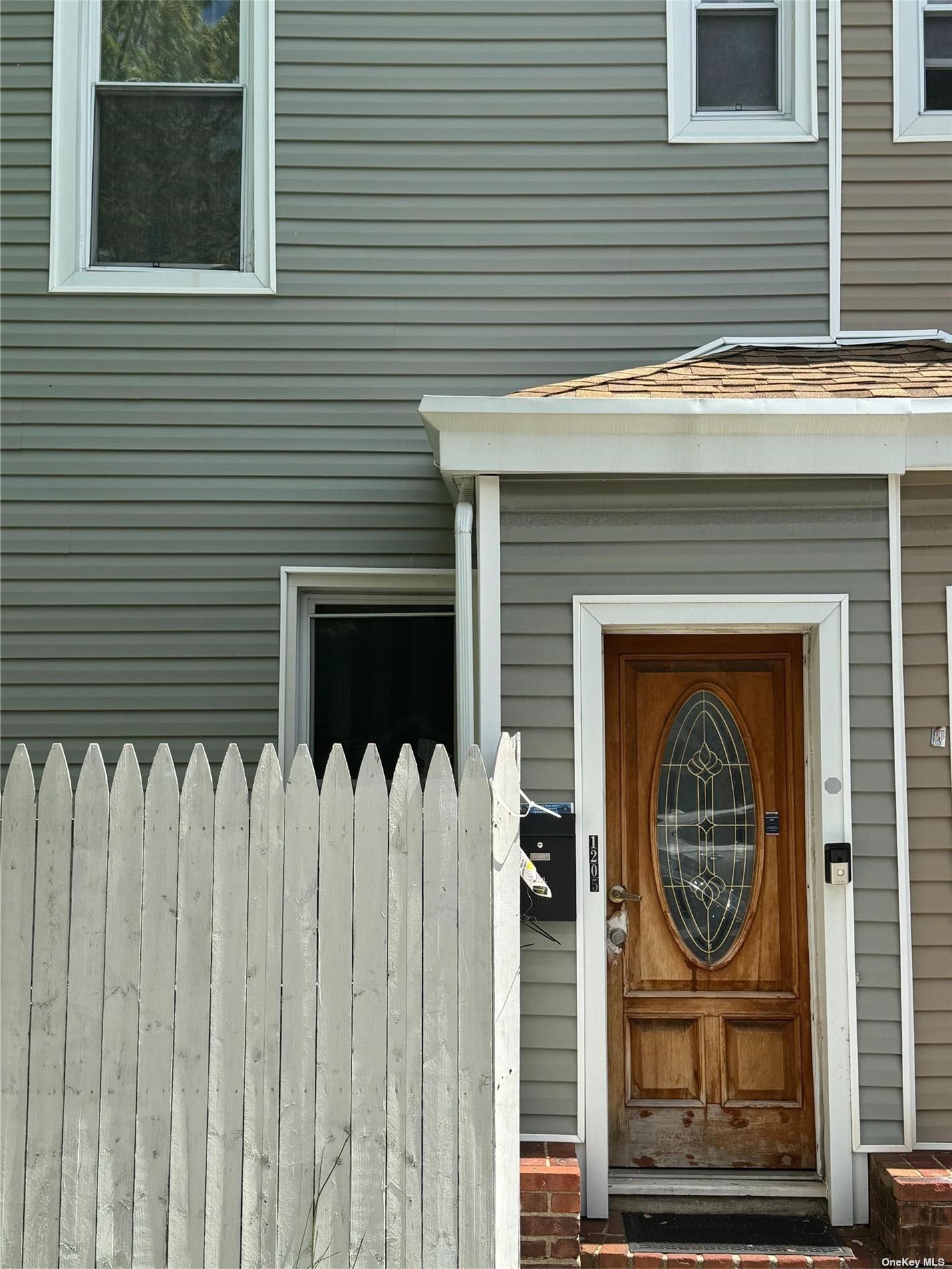 a front view of a house with a door