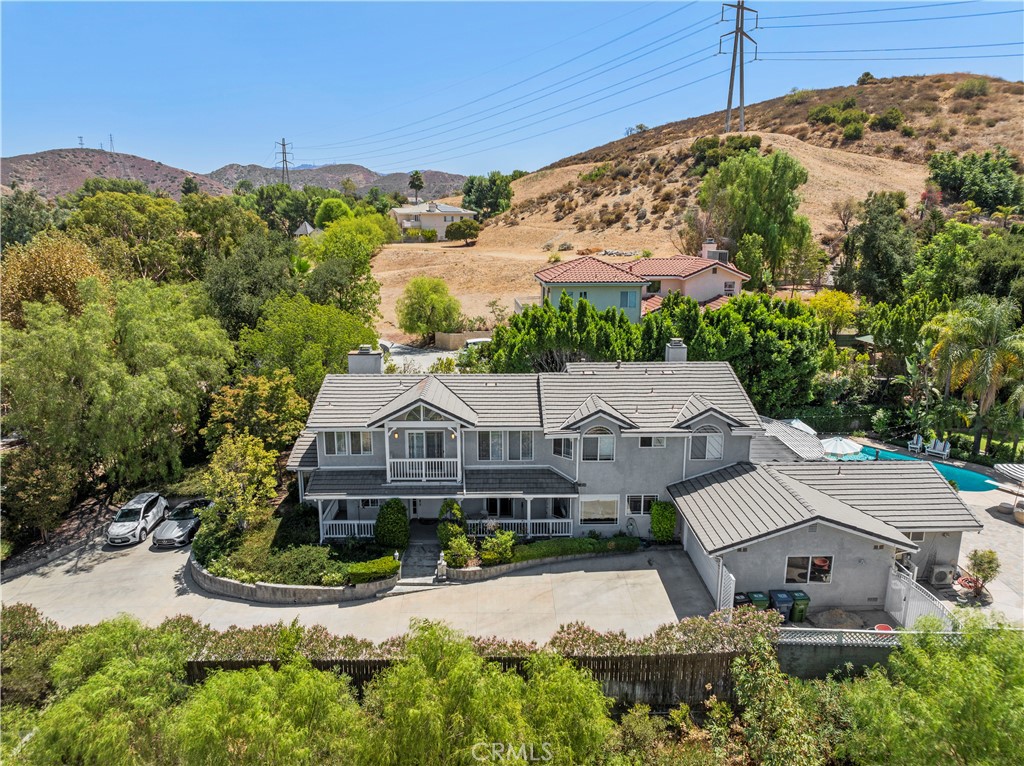 an aerial view of a house with a garden