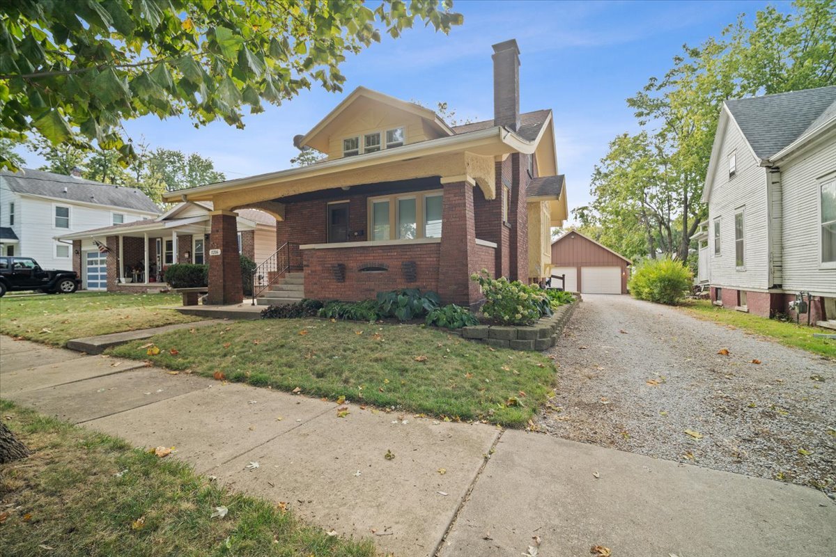 front view of house with a yard