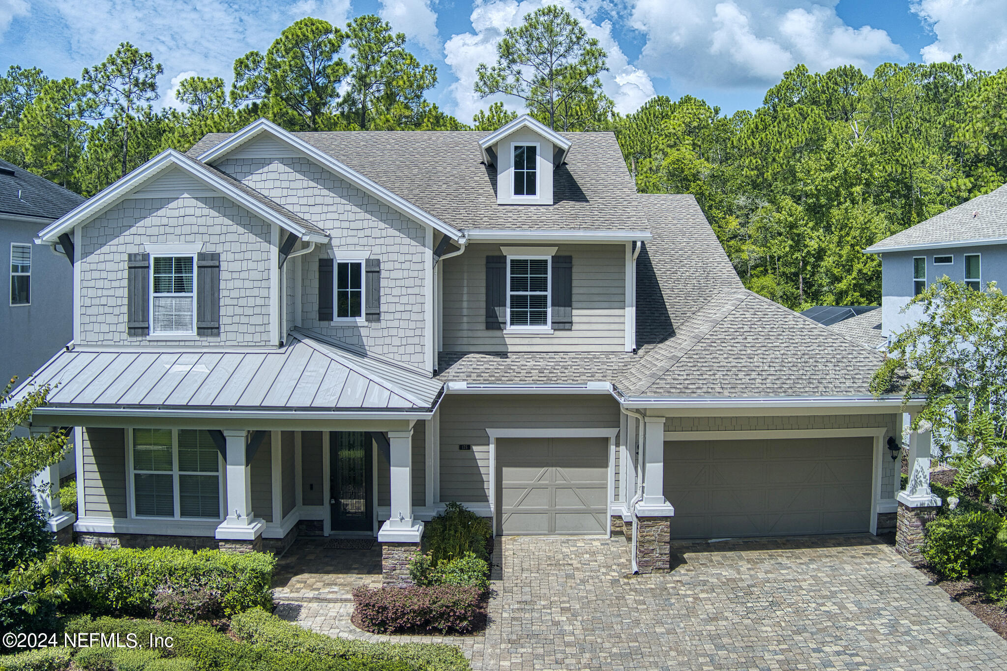 front view of a house with a yard