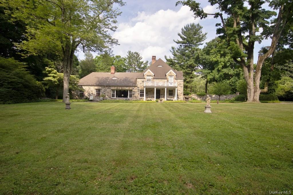 a view of a house with a big yard