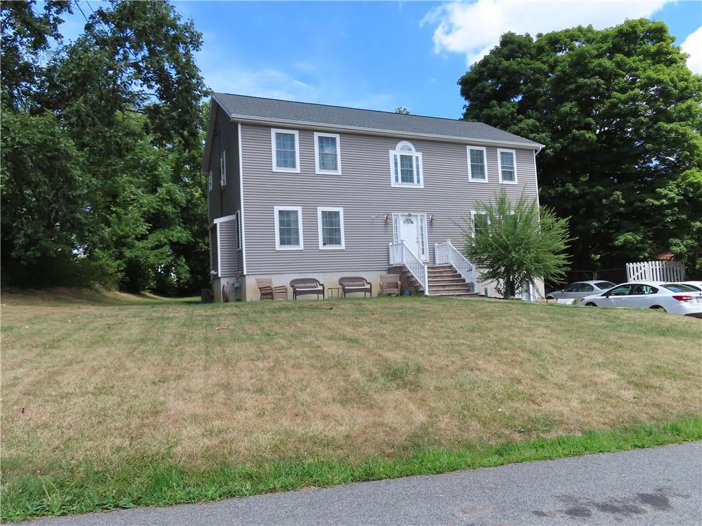 a front view of house with yard